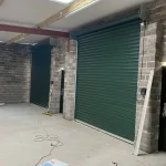 Two roller shutters during repair