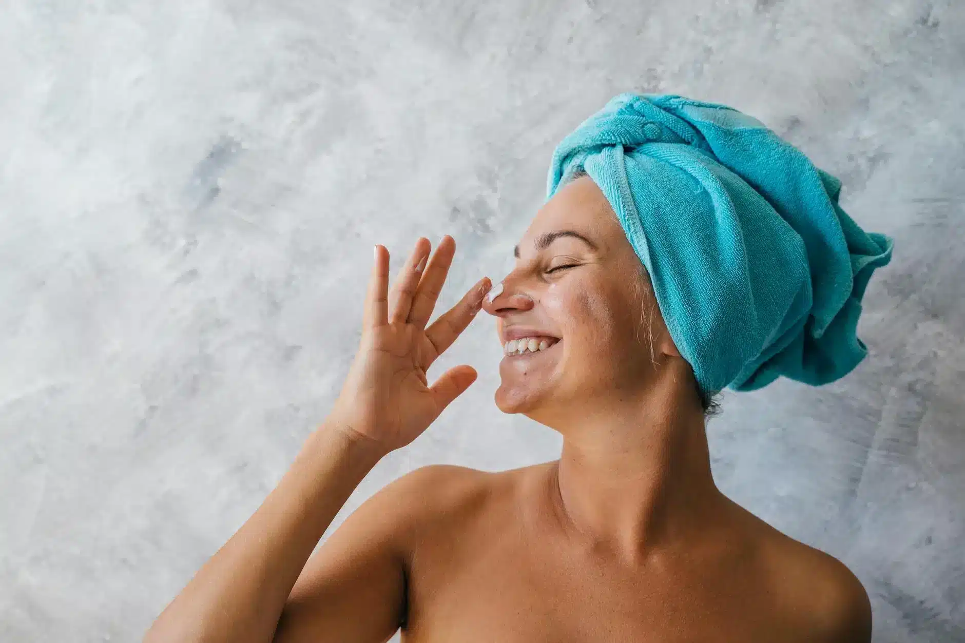 lady applying Bragan's Atopic cream to her face